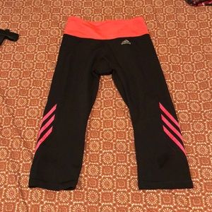 Black and pink adidas sports capris.